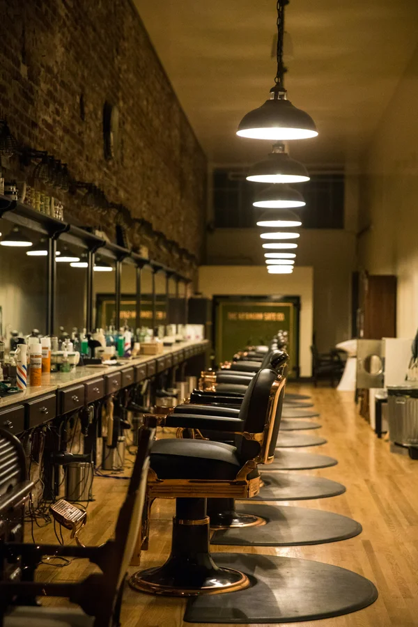 Luxury salon interior with elegant pendant lighting and modern furnishings